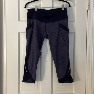 Lululemon crop leggins size 10 -purple and black horizontal thin strips